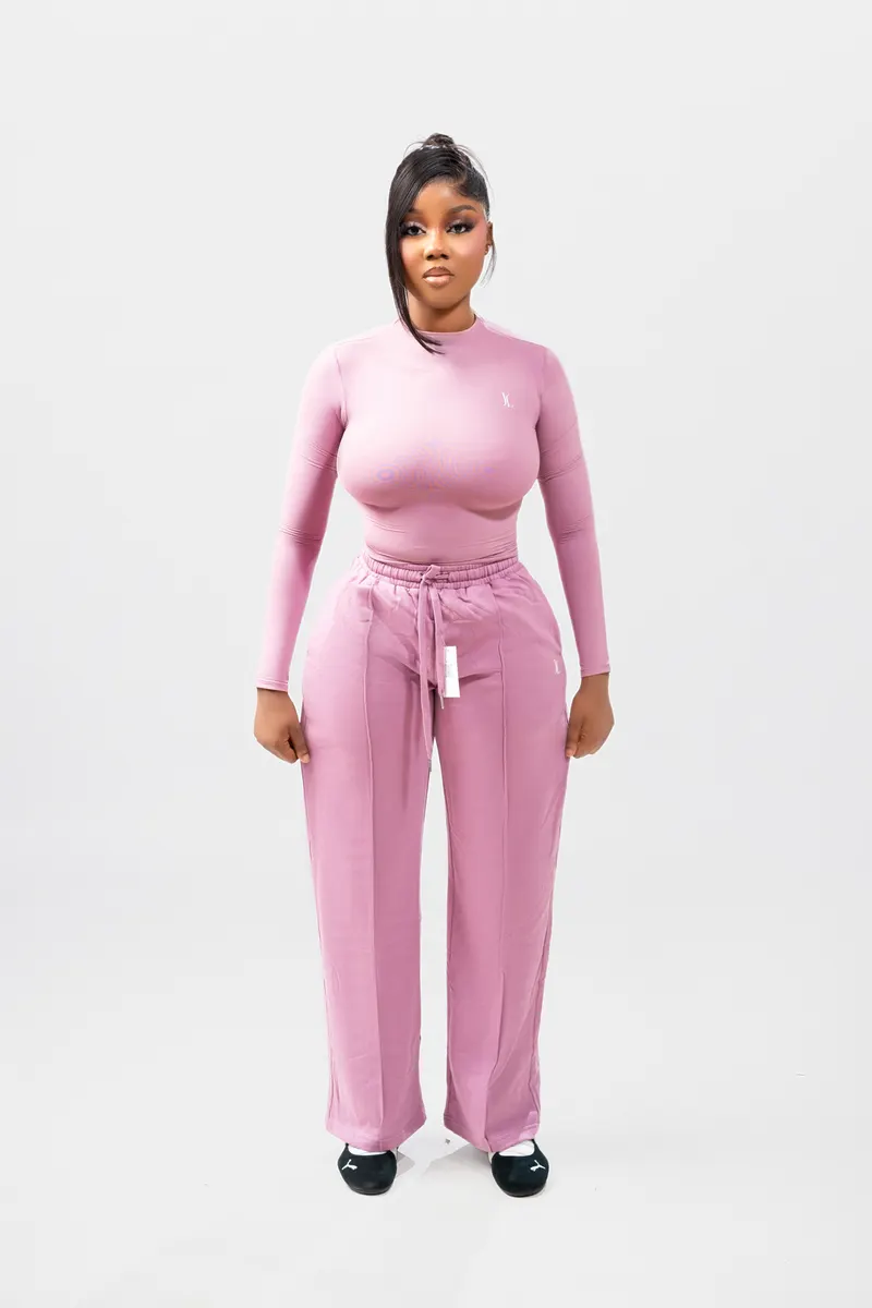 Pink activewear set, front standing pose